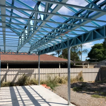 AAA project: View of a blue steel framework in a residential area under construction