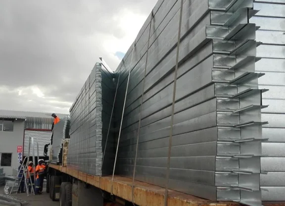 Loaded truck with galvanized steel frames, showcasing our efficient delivery services